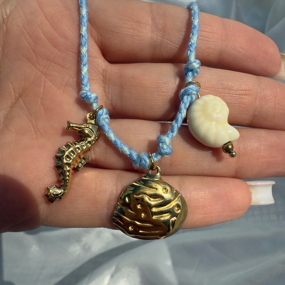 Shell, starfish, seahorse Charm Bracelet with Blue Cord - Picture 7 of 10